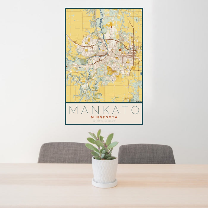 24x36 Mankato Minnesota Map Print Portrait Orientation in Woodblock Style Behind 2 Chairs Table and Potted Plant