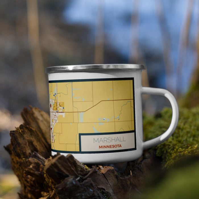 Right View Custom Marshall Minnesota Map Enamel Mug in Woodblock on Grass With Trees in Background