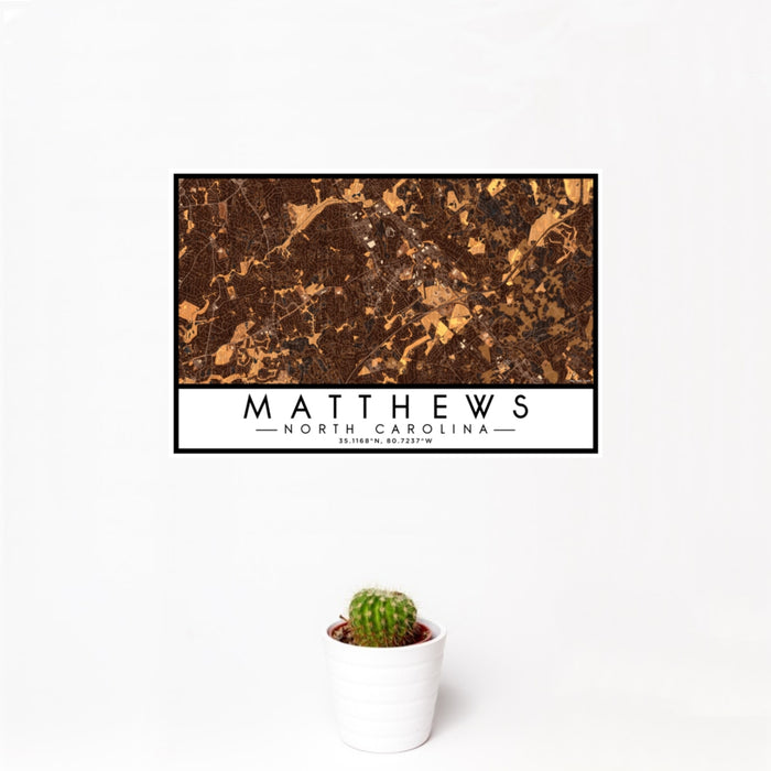 12x18 Matthews North Carolina Map Print Landscape Orientation in Ember Style With Small Cactus Plant in White Planter