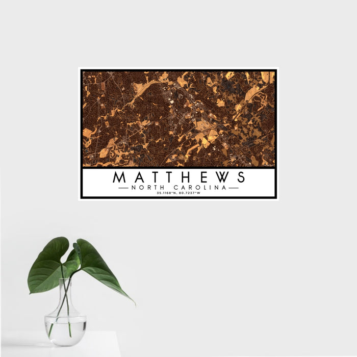 16x24 Matthews North Carolina Map Print Landscape Orientation in Ember Style With Tropical Plant Leaves in Water