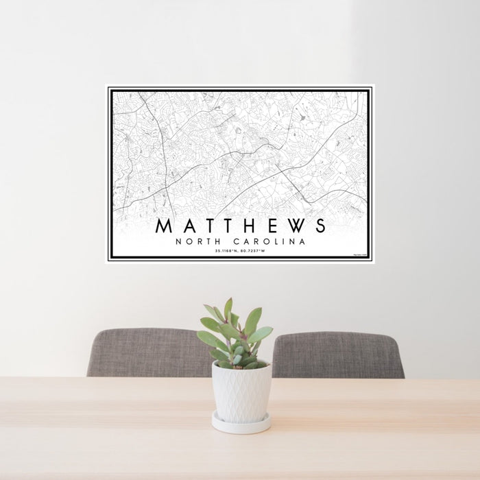 24x36 Matthews North Carolina Map Print Lanscape Orientation in Classic Style Behind 2 Chairs Table and Potted Plant