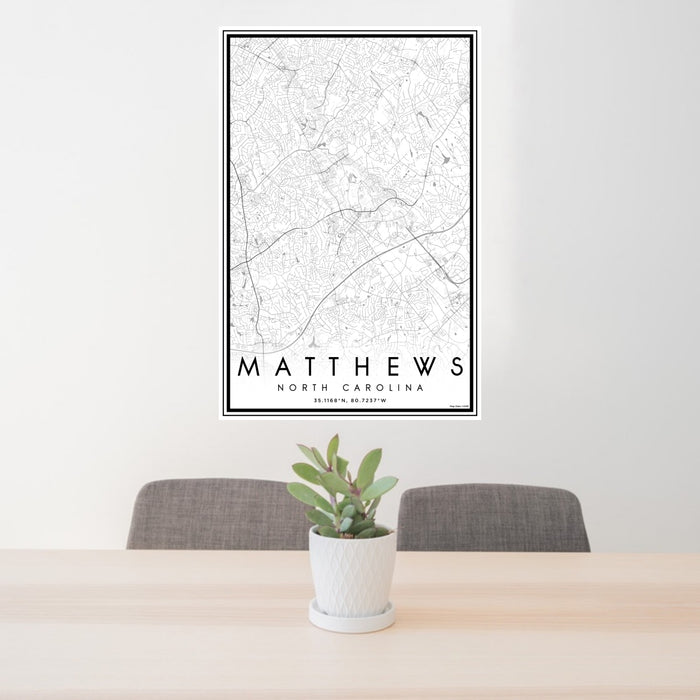 24x36 Matthews North Carolina Map Print Portrait Orientation in Classic Style Behind 2 Chairs Table and Potted Plant