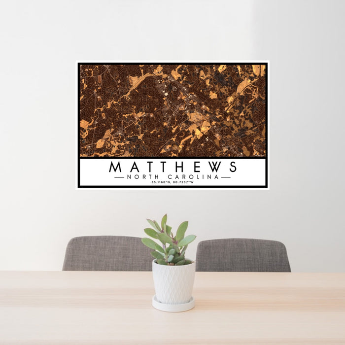 24x36 Matthews North Carolina Map Print Lanscape Orientation in Ember Style Behind 2 Chairs Table and Potted Plant