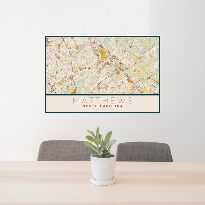 24x36 Matthews North Carolina Map Print Lanscape Orientation in Woodblock Style Behind 2 Chairs Table and Potted Plant