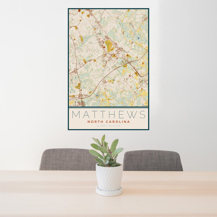 24x36 Matthews North Carolina Map Print Portrait Orientation in Woodblock Style Behind 2 Chairs Table and Potted Plant