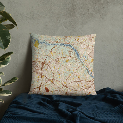 Custom McLean Virginia Map Throw Pillow in Woodblock on Bedding Against Wall
