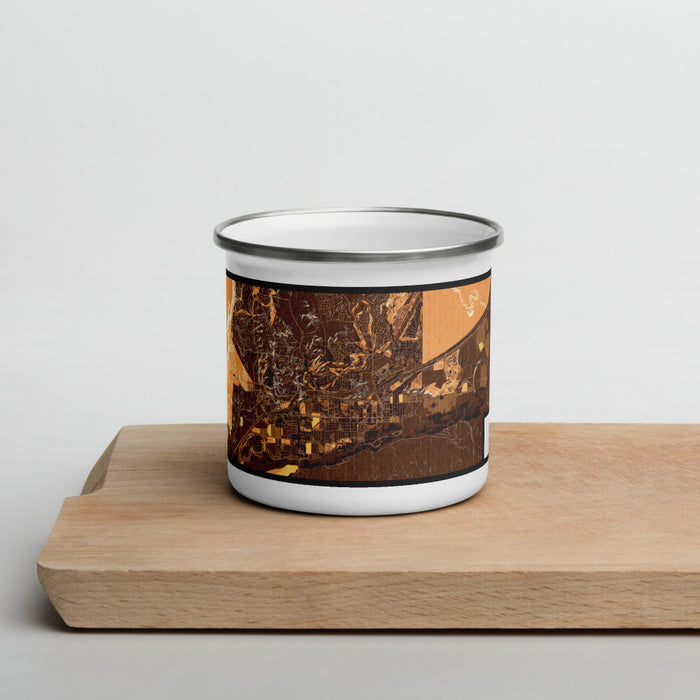 Front View Custom Mesquite Nevada Map Enamel Mug in Ember on Cutting Board