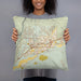 Person holding 18x18 Custom Mesquite Nevada Map Throw Pillow in Woodblock