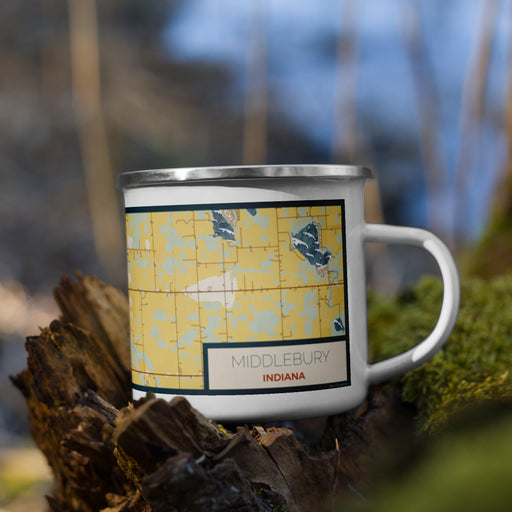 Right View Custom Middlebury Indiana Map Enamel Mug in Woodblock on Grass With Trees in Background