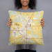 Person holding 18x18 Custom Middlebury Indiana Map Throw Pillow in Woodblock