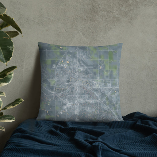 Custom Minot North Dakota Map Throw Pillow in Afternoon on Bedding Against Wall