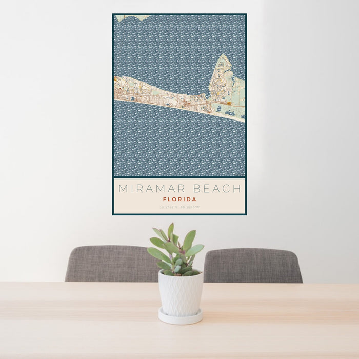 24x36 Miramar Beach Florida Map Print Portrait Orientation in Woodblock Style Behind 2 Chairs Table and Potted Plant