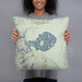 Person holding 18x18 Custom Mono Lake California Map Throw Pillow in Woodblock