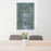 24x36 Mora Minnesota Map Print Portrait Orientation in Afternoon Style Behind 2 Chairs Table and Potted Plant