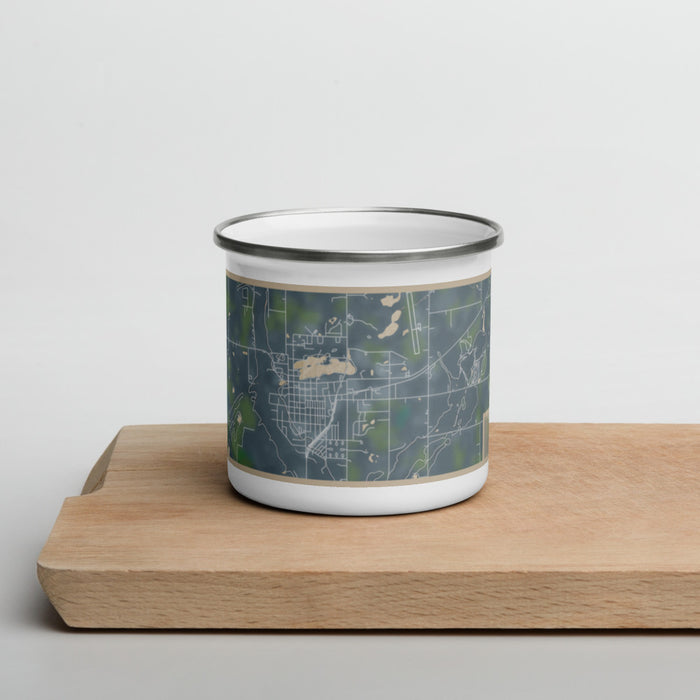 Front View Custom Mora Minnesota Map Enamel Mug in Afternoon on Cutting Board