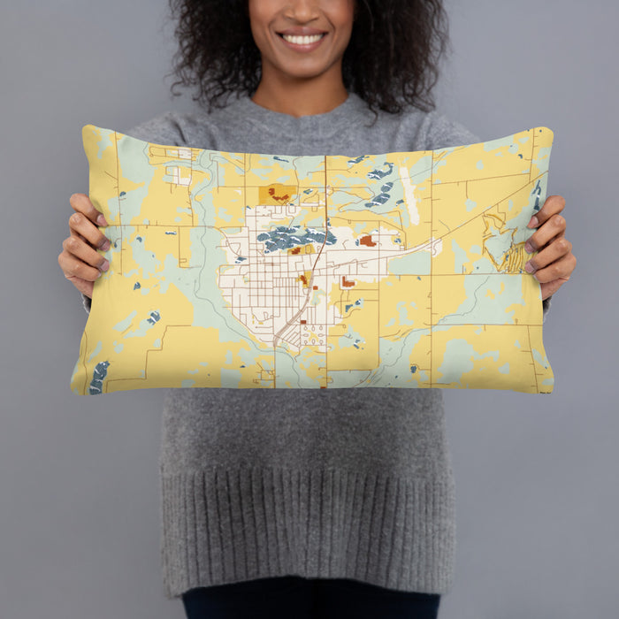 Person holding 20x12 Custom Mora Minnesota Map Throw Pillow in Woodblock