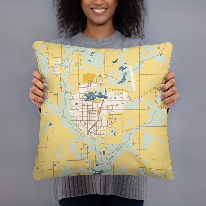 Person holding 18x18 Custom Mora Minnesota Map Throw Pillow in Woodblock