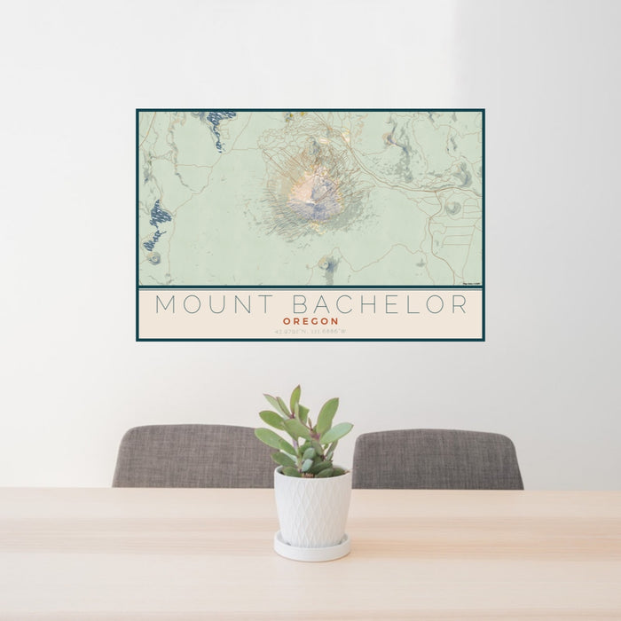 24x36 Mount Bachelor Oregon Map Print Lanscape Orientation in Woodblock Style Behind 2 Chairs Table and Potted Plant
