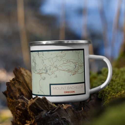 Right View Custom Mount Bachelor Oregon Map Enamel Mug in Woodblock on Grass With Trees in Background