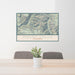 24x36 Mount Eolus Colorado Map Print Lanscape Orientation in Woodblock Style Behind 2 Chairs Table and Potted Plant