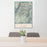 24x36 Mount Eolus Colorado Map Print Portrait Orientation in Woodblock Style Behind 2 Chairs Table and Potted Plant