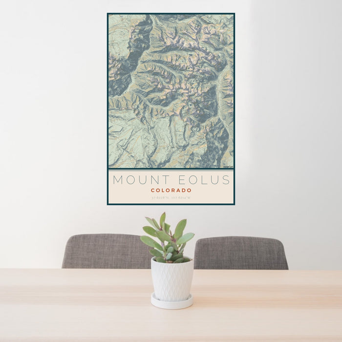 24x36 Mount Eolus Colorado Map Print Portrait Orientation in Woodblock Style Behind 2 Chairs Table and Potted Plant