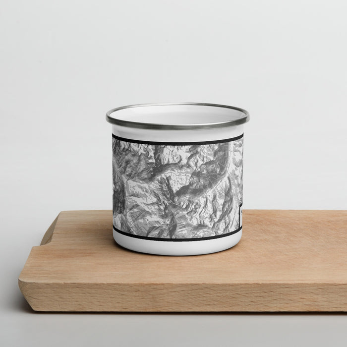 Front View Custom Mount Mystery Washington Map Enamel Mug in Classic on Cutting Board