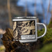 Right View Custom Mount Mystery Washington Map Enamel Mug in Ember on Grass With Trees in Background