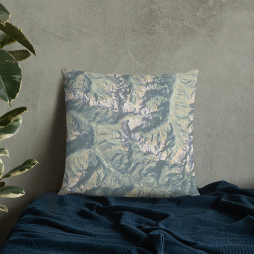 Custom Mount Mystery Washington Map Throw Pillow in Woodblock on Bedding Against Wall
