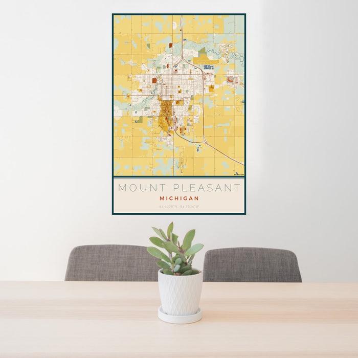 24x36 Mount Pleasant Michigan Map Print Portrait Orientation in Woodblock Style Behind 2 Chairs Table and Potted Plant