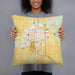 Person holding 18x18 Custom Mount Pleasant Michigan Map Throw Pillow in Woodblock