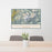 24x36 Mount Shuksan Washington Map Print Lanscape Orientation in Woodblock Style Behind 2 Chairs Table and Potted Plant