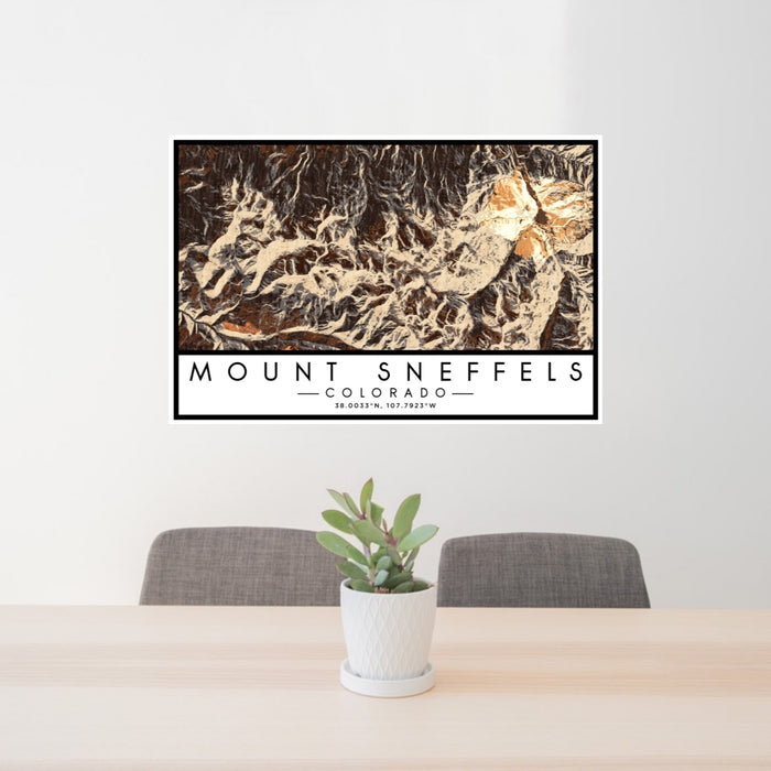 24x36 Mount Sneffels Colorado Map Print Lanscape Orientation in Ember Style Behind 2 Chairs Table and Potted Plant