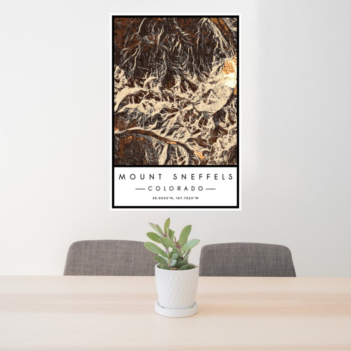 24x36 Mount Sneffels Colorado Map Print Portrait Orientation in Ember Style Behind 2 Chairs Table and Potted Plant