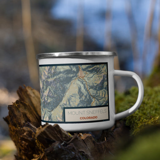 Right View Custom Mount Sneffels Colorado Map Enamel Mug in Woodblock on Grass With Trees in Background