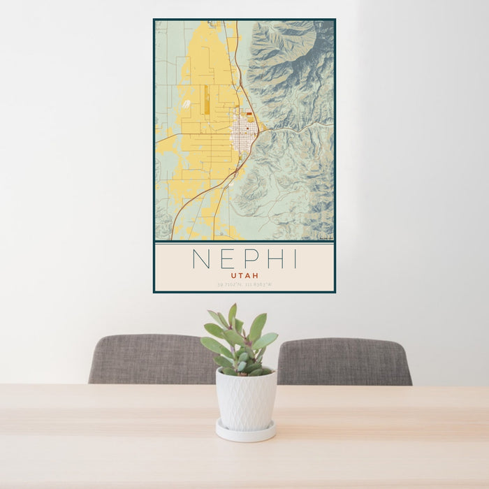 24x36 Nephi Utah Map Print Portrait Orientation in Woodblock Style Behind 2 Chairs Table and Potted Plant