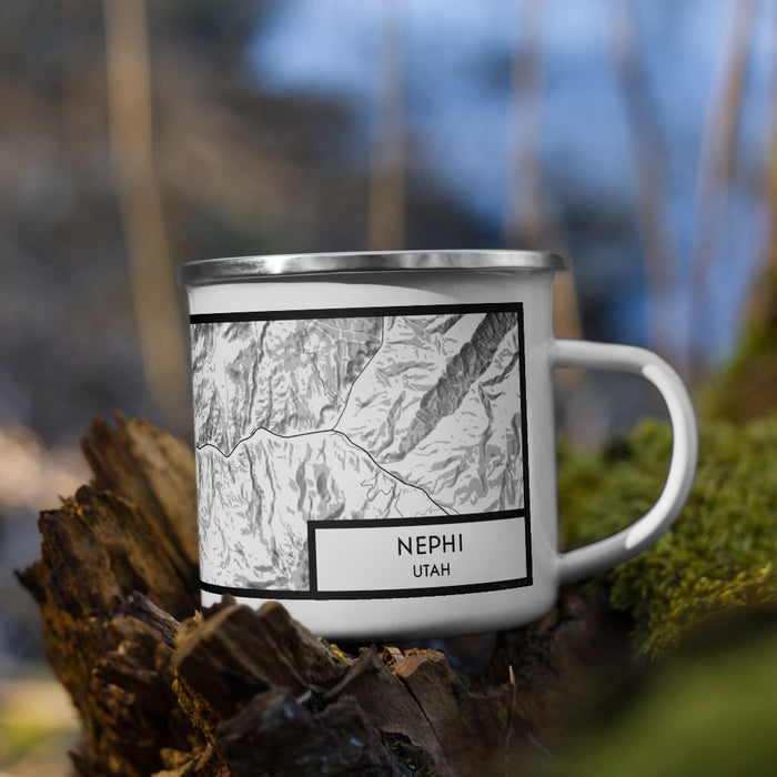 Right View Custom Nephi Utah Map Enamel Mug in Classic on Grass With Trees in Background