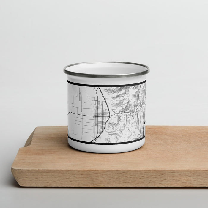 Front View Custom Nephi Utah Map Enamel Mug in Classic on Cutting Board