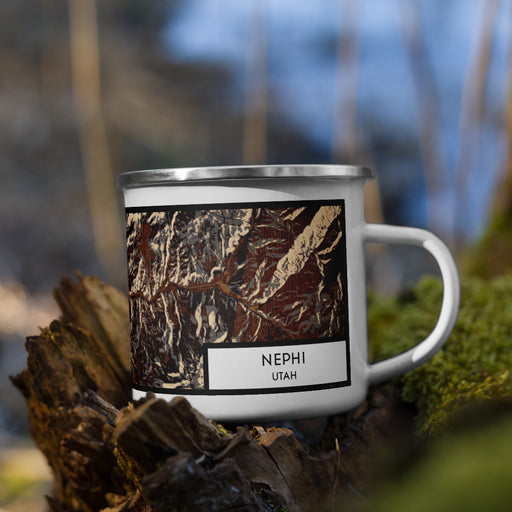 Right View Custom Nephi Utah Map Enamel Mug in Ember on Grass With Trees in Background