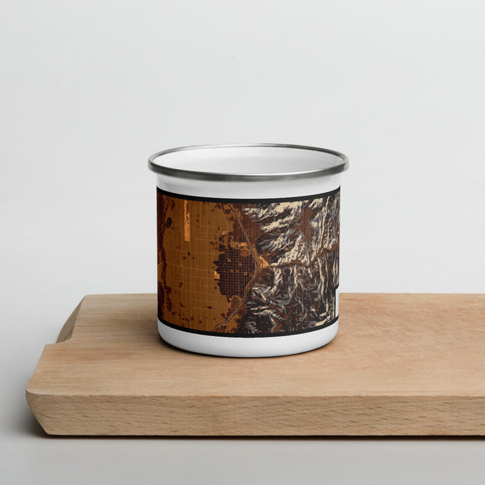 Front View Custom Nephi Utah Map Enamel Mug in Ember on Cutting Board