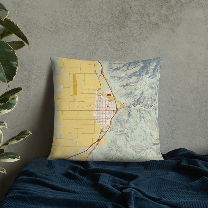 Custom Nephi Utah Map Throw Pillow in Woodblock on Bedding Against Wall