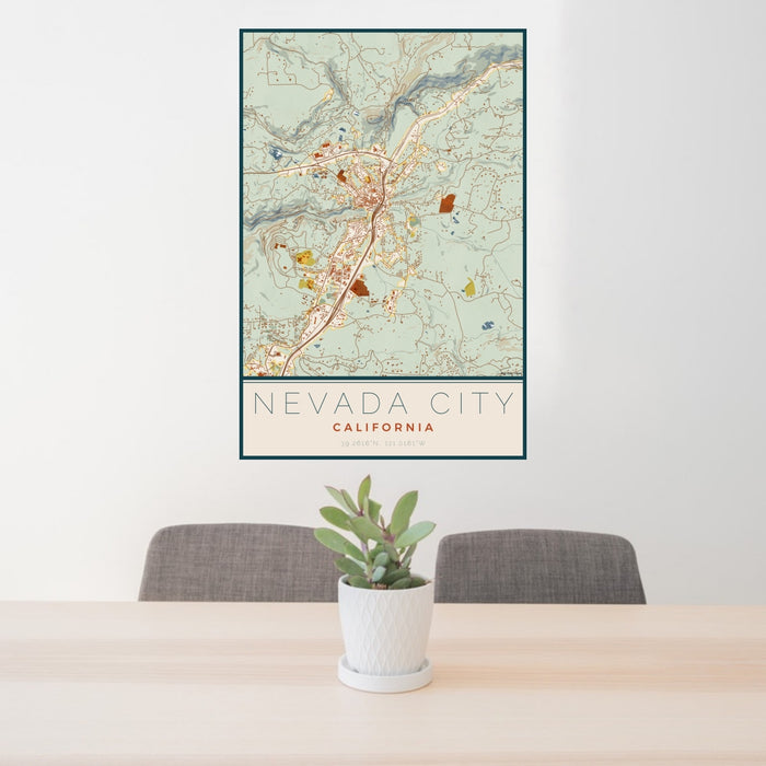 24x36 Nevada City California Map Print Portrait Orientation in Woodblock Style Behind 2 Chairs Table and Potted Plant