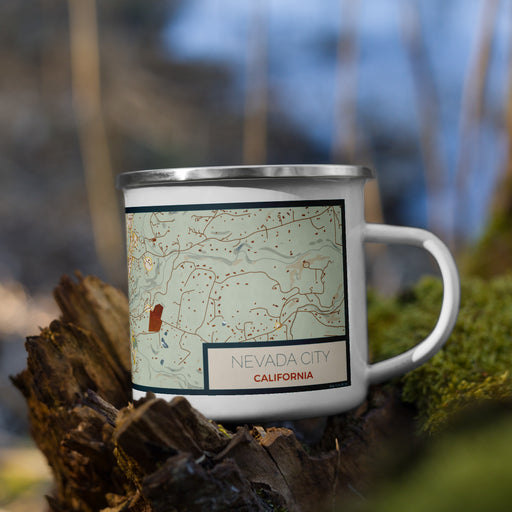 Right View Custom Nevada City California Map Enamel Mug in Woodblock on Grass With Trees in Background