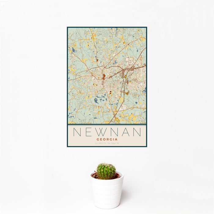 12x18 Newnan Georgia Map Print Portrait Orientation in Woodblock Style With Small Cactus Plant in White Planter