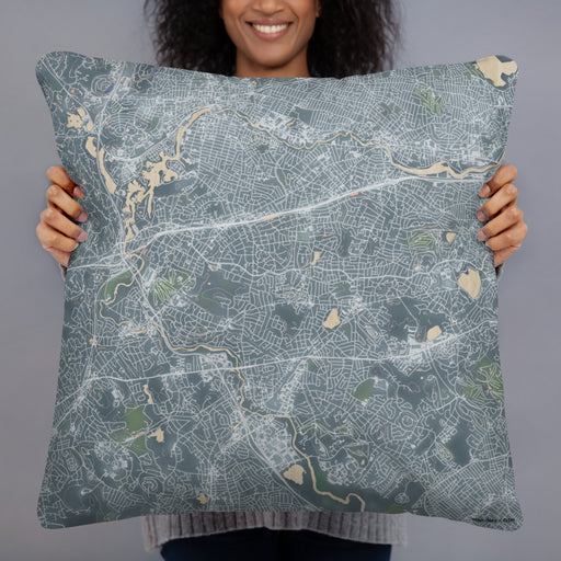 Person holding 22x22 Custom Newton Massachusetts Map Throw Pillow in Afternoon