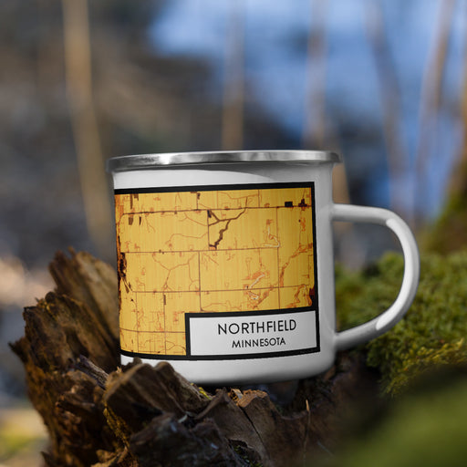 Right View Custom Northfield Minnesota Map Enamel Mug in Ember on Grass With Trees in Background