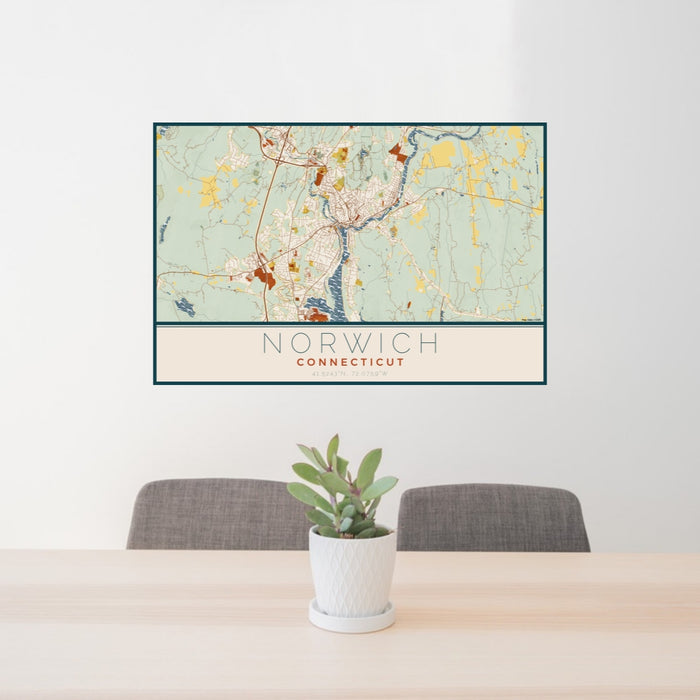 24x36 Norwich Connecticut Map Print Lanscape Orientation in Woodblock Style Behind 2 Chairs Table and Potted Plant