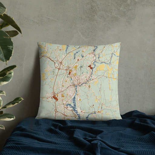 Custom Norwich Connecticut Map Throw Pillow in Woodblock on Bedding Against Wall
