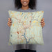 Person holding 18x18 Custom Norwich Connecticut Map Throw Pillow in Woodblock