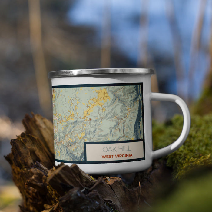 Right View Custom Oak Hill West Virginia Map Enamel Mug in Woodblock on Grass With Trees in Background